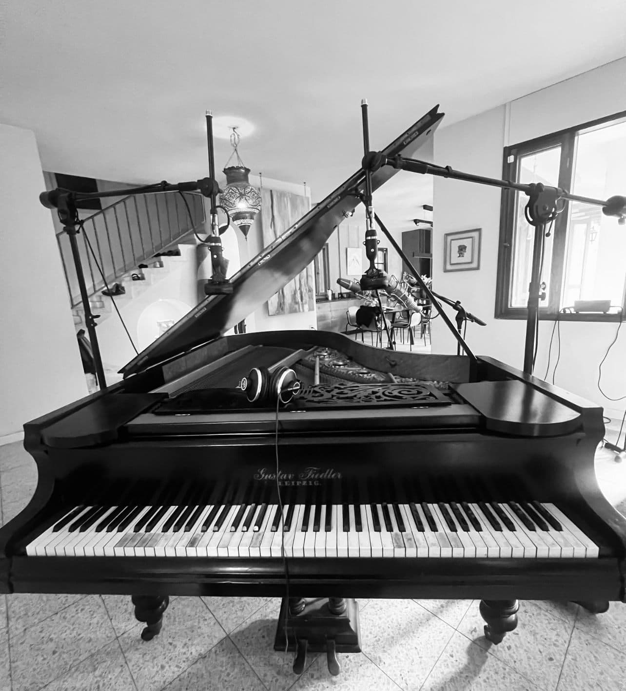 The 1871 concert grand piano miked in the castle living room